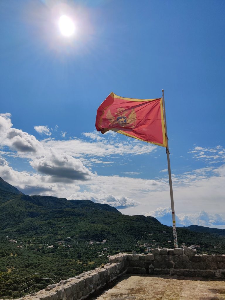 Montenegro flag on the ramparts of the fortress in Bar